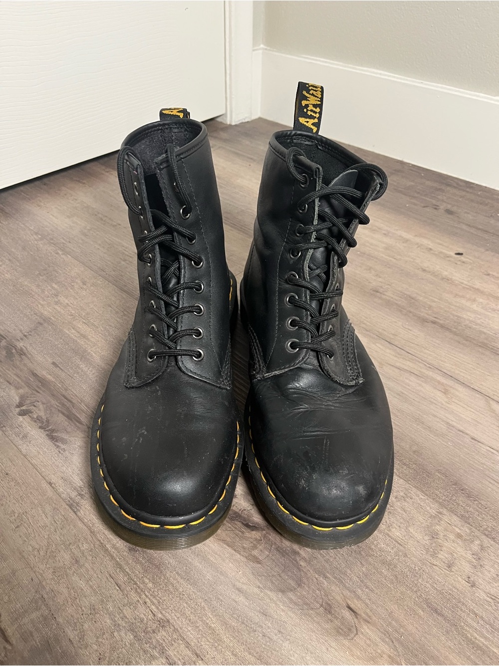 Dr. Martens Black Leather 8-Eye Lace-Up Boots with Yellow Stitching